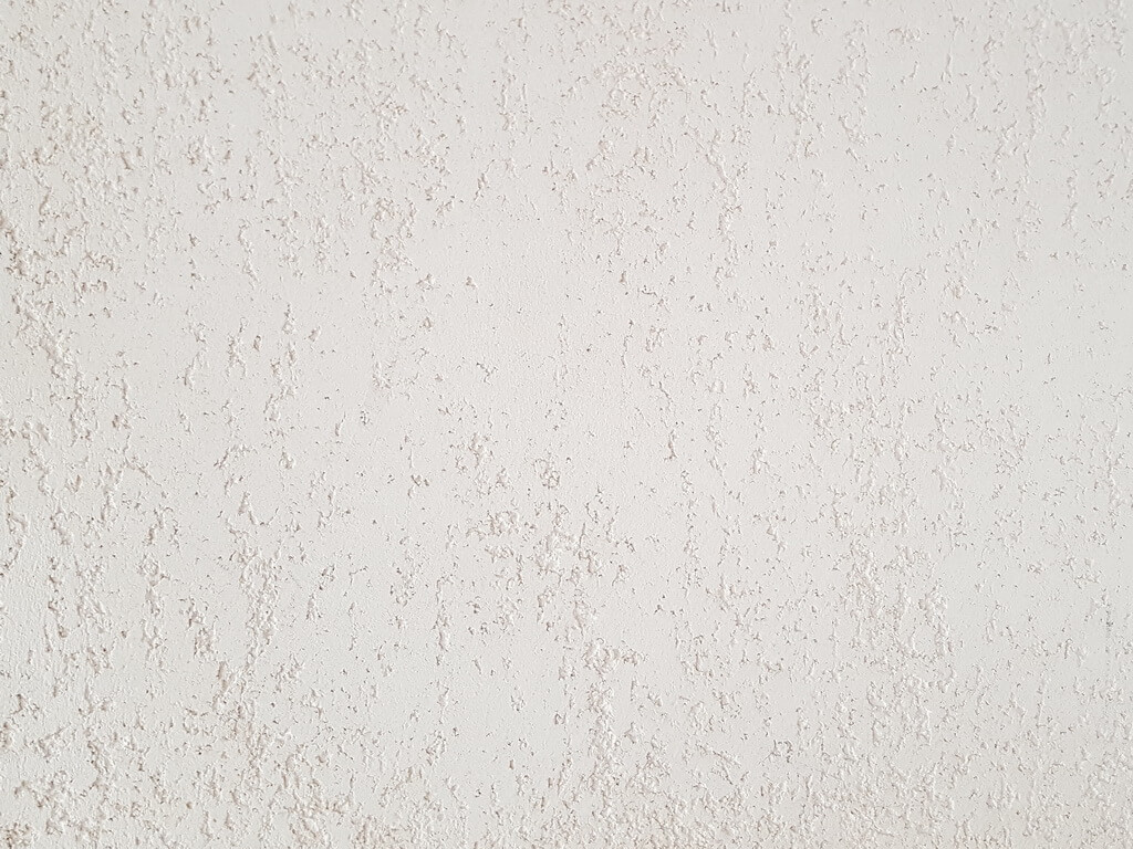 Фактурная штукатурка с минеральным наполнителем Алюр Траверто Фасад. Фактурный рисунок шлифованный Травертин. Вид вблизи Фактурная штукатурка с минеральным наполнителем Алюр Траверто Фасад. Фактурный рисунок шлифованный Травертин. Вид вблизи