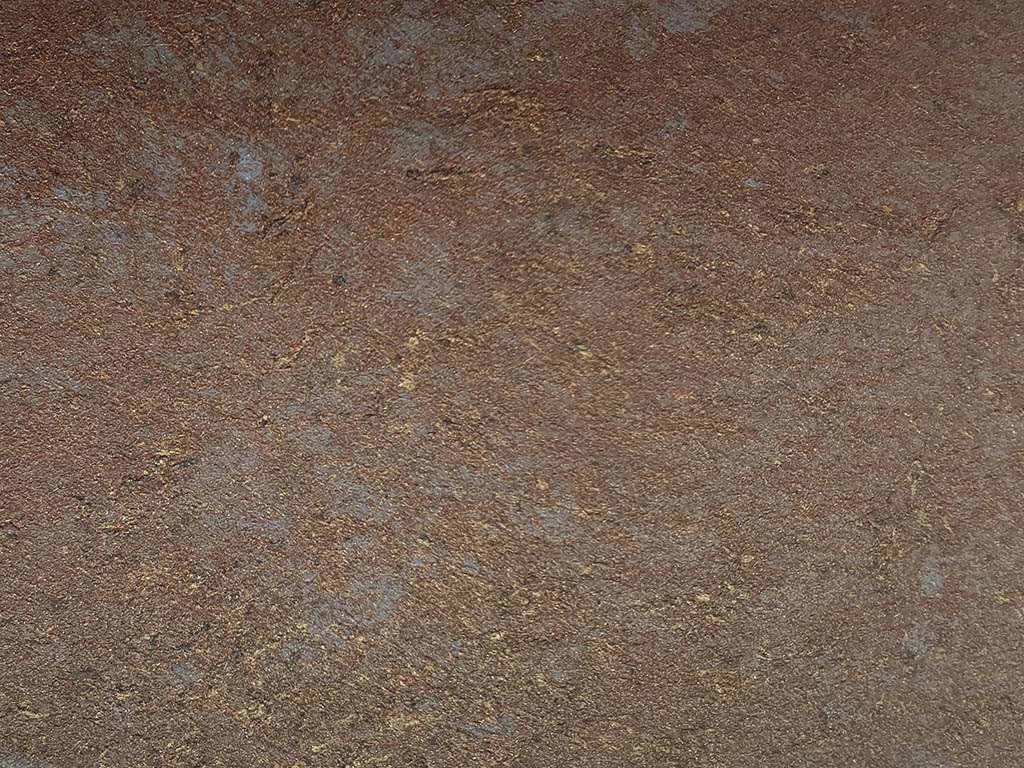 Матовая краска с чёрными и золотыми флоками Goldshell Небиа Гранж Неро. Классическое нанесение. Вид вблизи