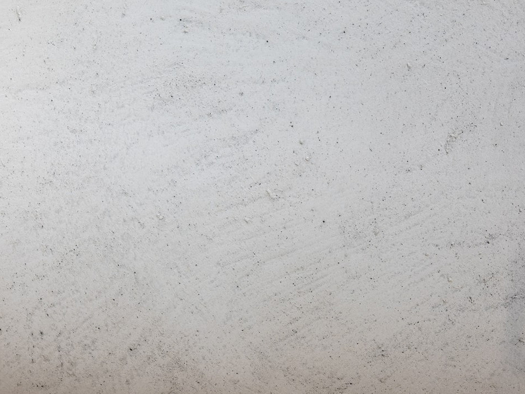 Фактурная штукатурка с эффектом имитации гранита Goldshell Траверто Градо. Имитация гладкого бетона. Цвет ACS 48 (160 мл). Вид вблизи