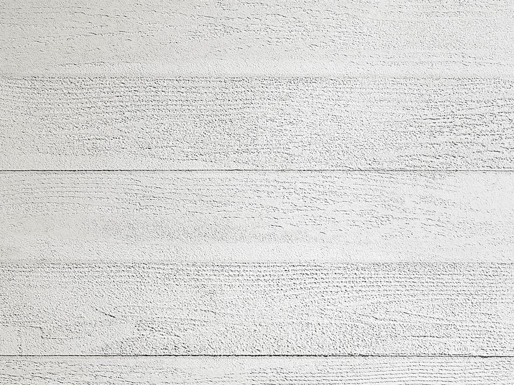 Фактурная штукатурка Oikos Travertino Romano Naturale. Имитация деревянной опалубки. Базовый цвет. Вид вблизи