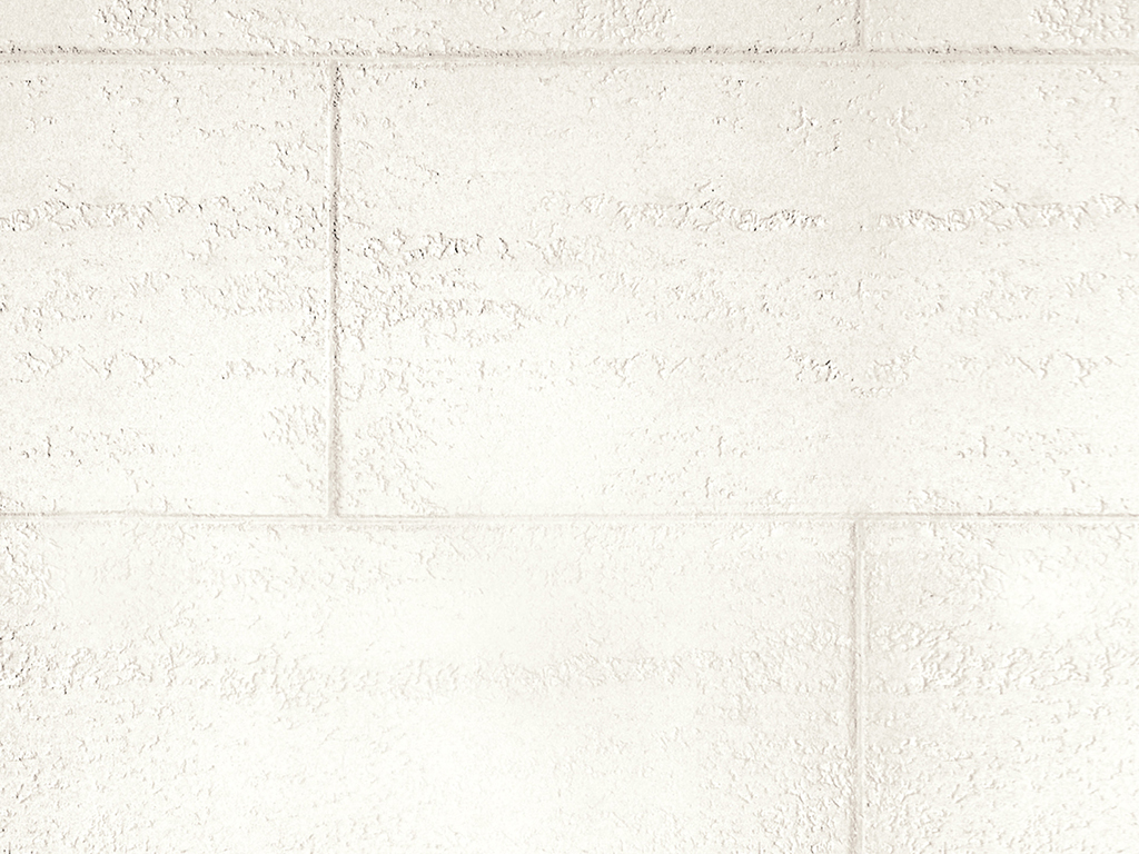 Фактурная штукатурка Oikos Travertino Romano Naturale. Имитация кладки с рустами. Базовый цвет. Вид вблизи